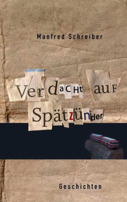 Auf dem Buchumschlag ist eine Modell-Lok mit Anhänger zu sehen und der Buchtitel besteht aus aus Zeitungen ausgeschnittenen Buchstaben.